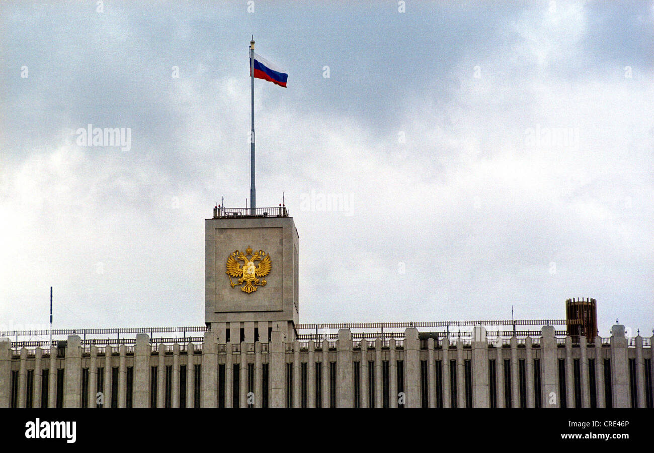 Moscow, flag and coat of arms at the White House, the seat of government Stock Photo
