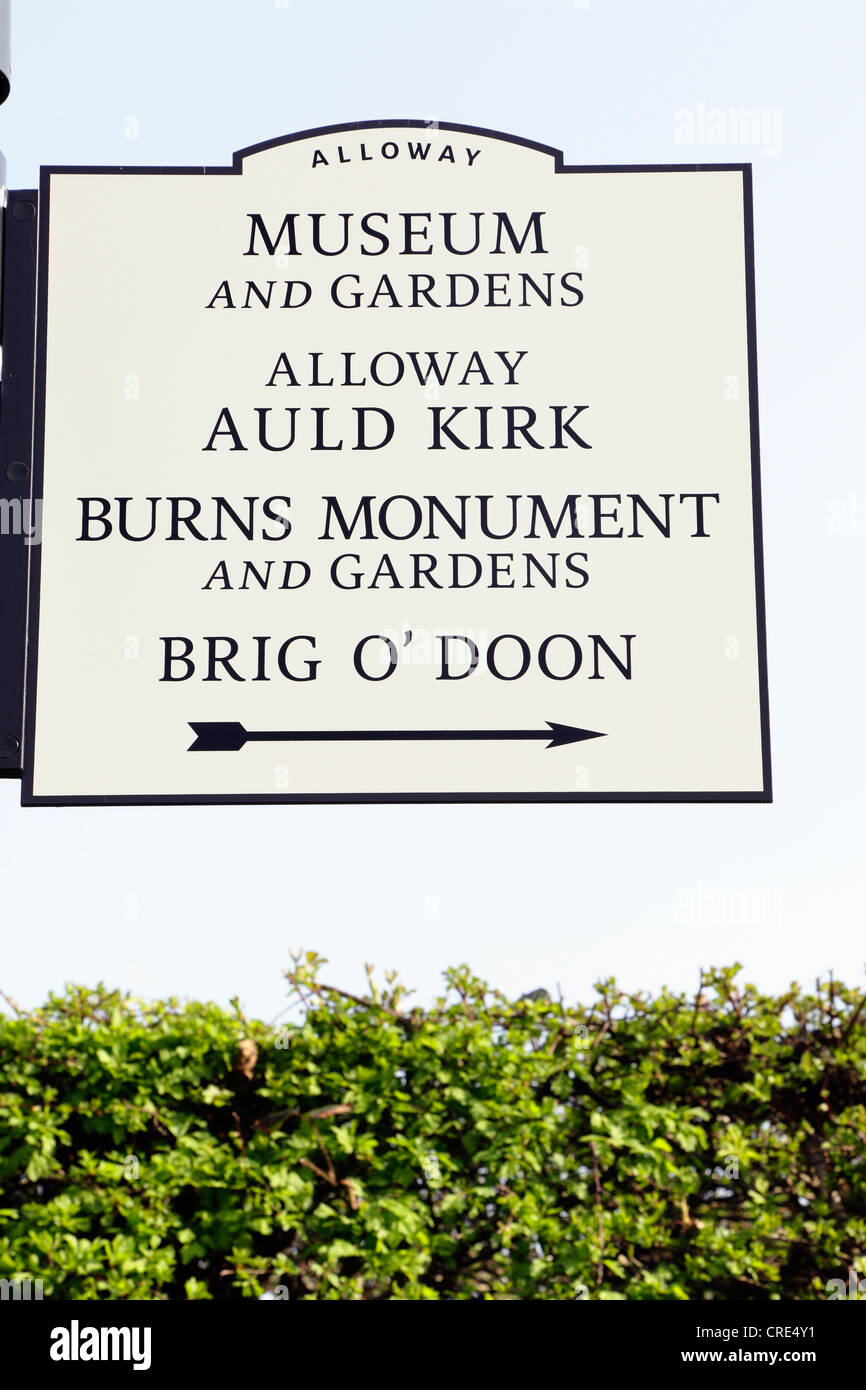 Robert Burns Birthplace Museum sign with directions to Museum, Gardens, Alloway Auld Kirk, Monument, Brig O Doon in Alloway, Ayrshire, Scotland, UK Stock Photo