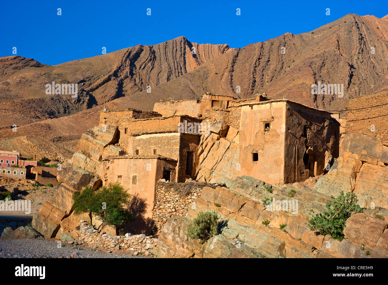 Mountain landscape in the valley of Ait Mansour with a few simple, mud-walled residential houses, Anti-Atlas mountain range Stock Photo