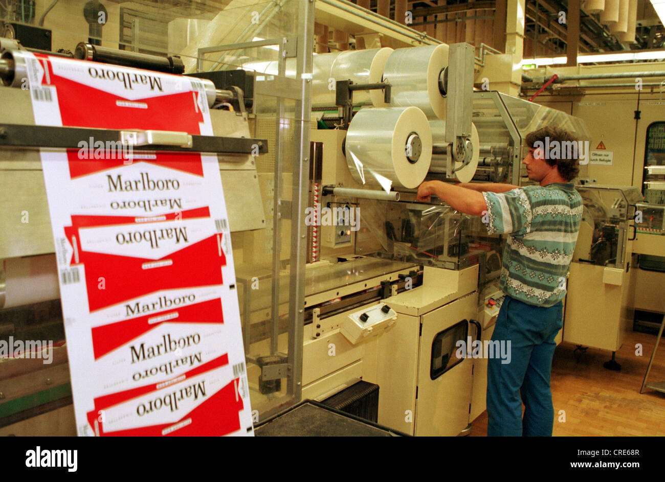 A worker at Philip Morris factory in BerlinNeukoelln, Germany Stock