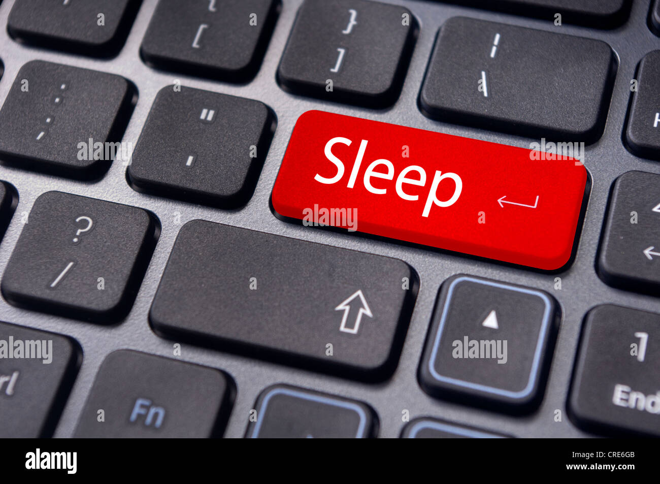 sleep concepts for office lifestyle, with message on computer keyboard. Stock Photo