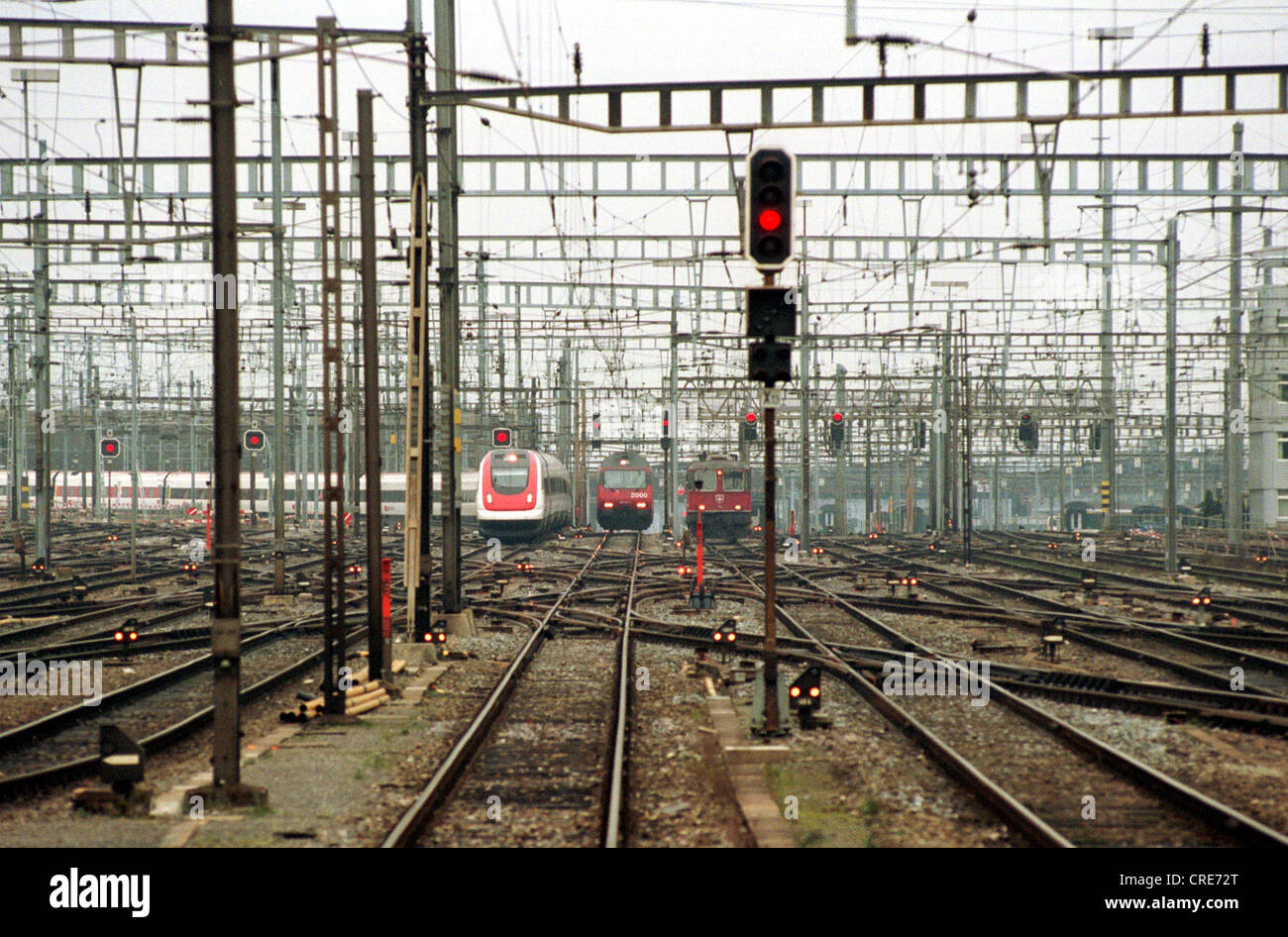 Railway tracks with three locomotives retracting the SBB main station of Zurich, Switzerland Stock Photo