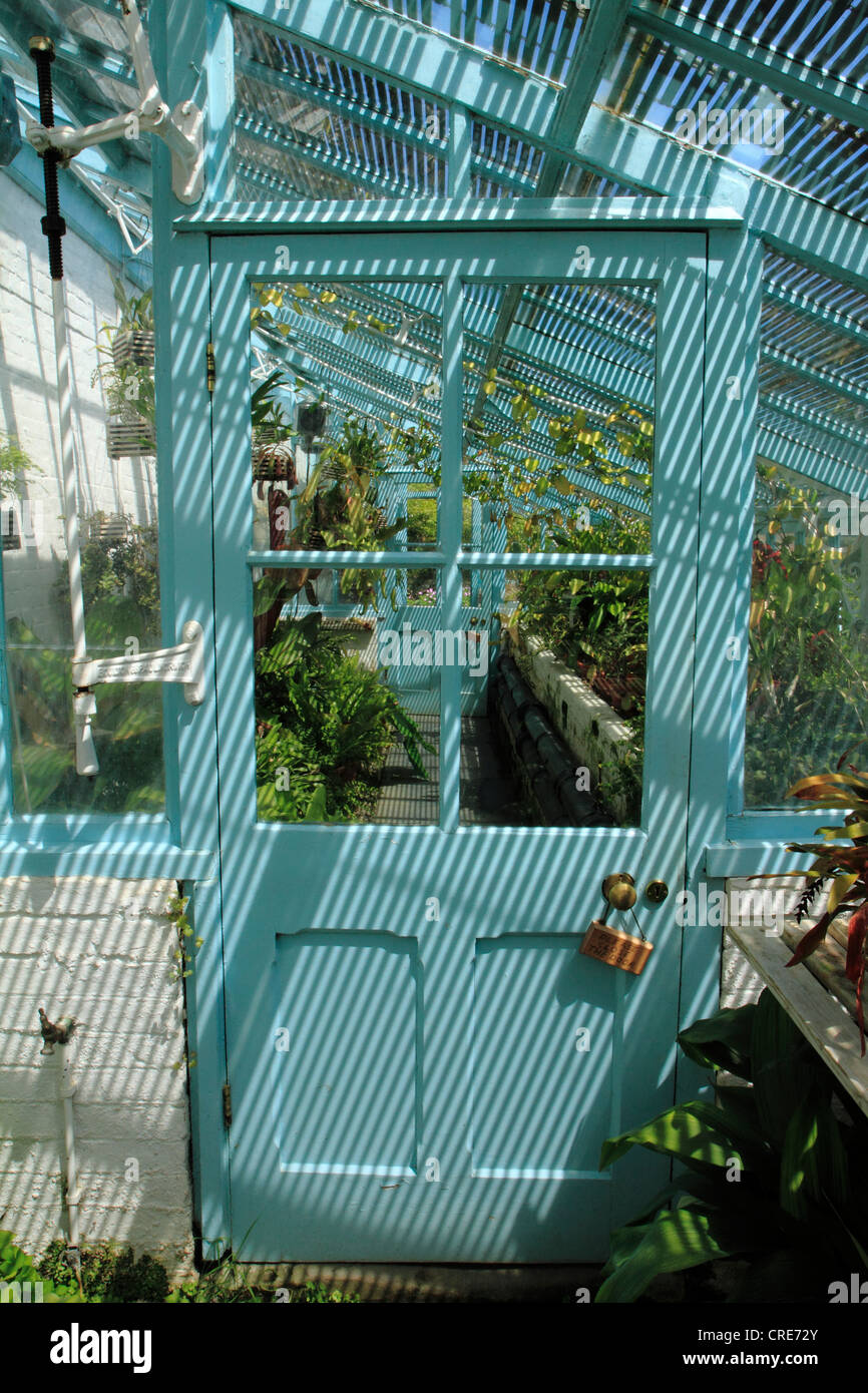 Greenhouse and door to tropical plant hothouse at Down House, home of Charles Darwin, Downe, Kent UK Stock Photo