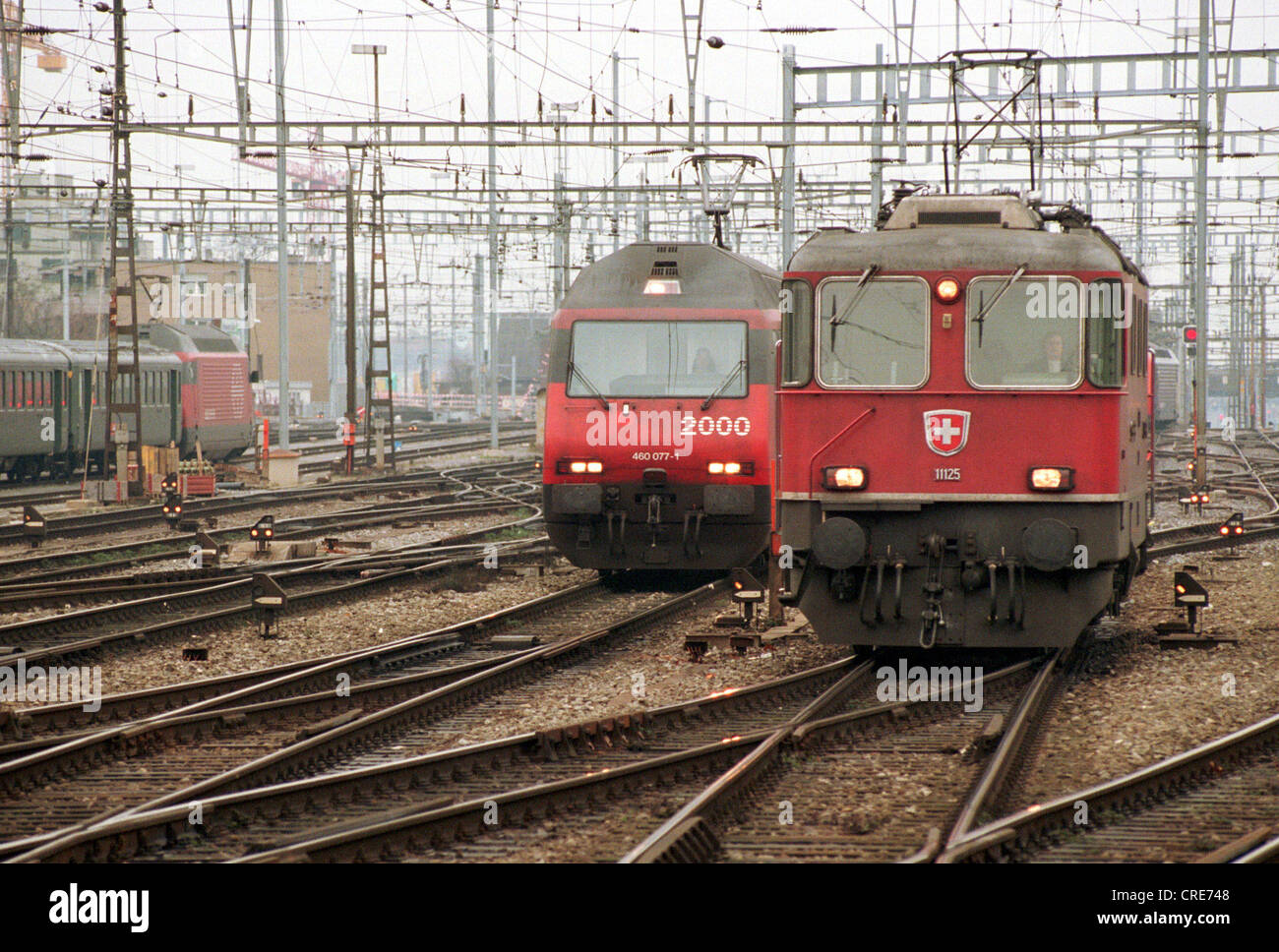 Railway tracks with two locomotives retracting the SBB train station Zurich, Switzerland Stock Photo