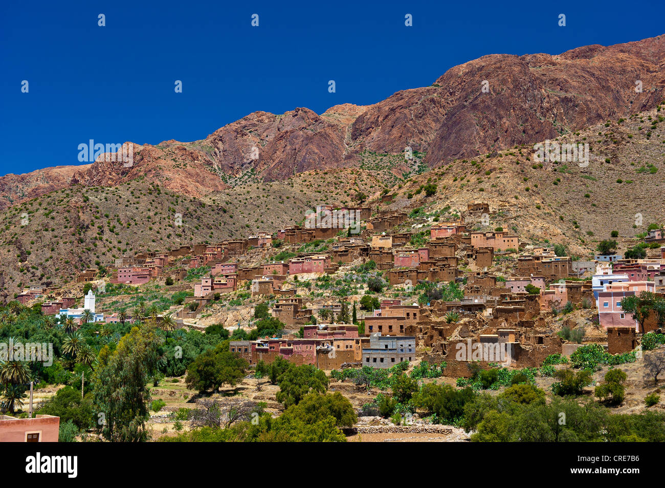 Typical mountain scenery in the Anti Atlas Mountains with a village with a mosque on a hill, Anti-Atlas Mountains Stock Photo