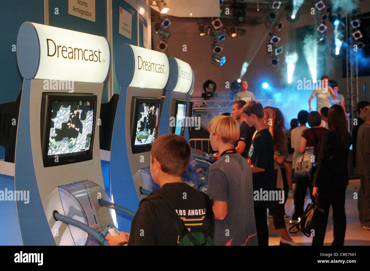 Teenagers playing on a Sega Dreamcast Playstation, IFA 1999, Berlin, Germany Stock Photo
