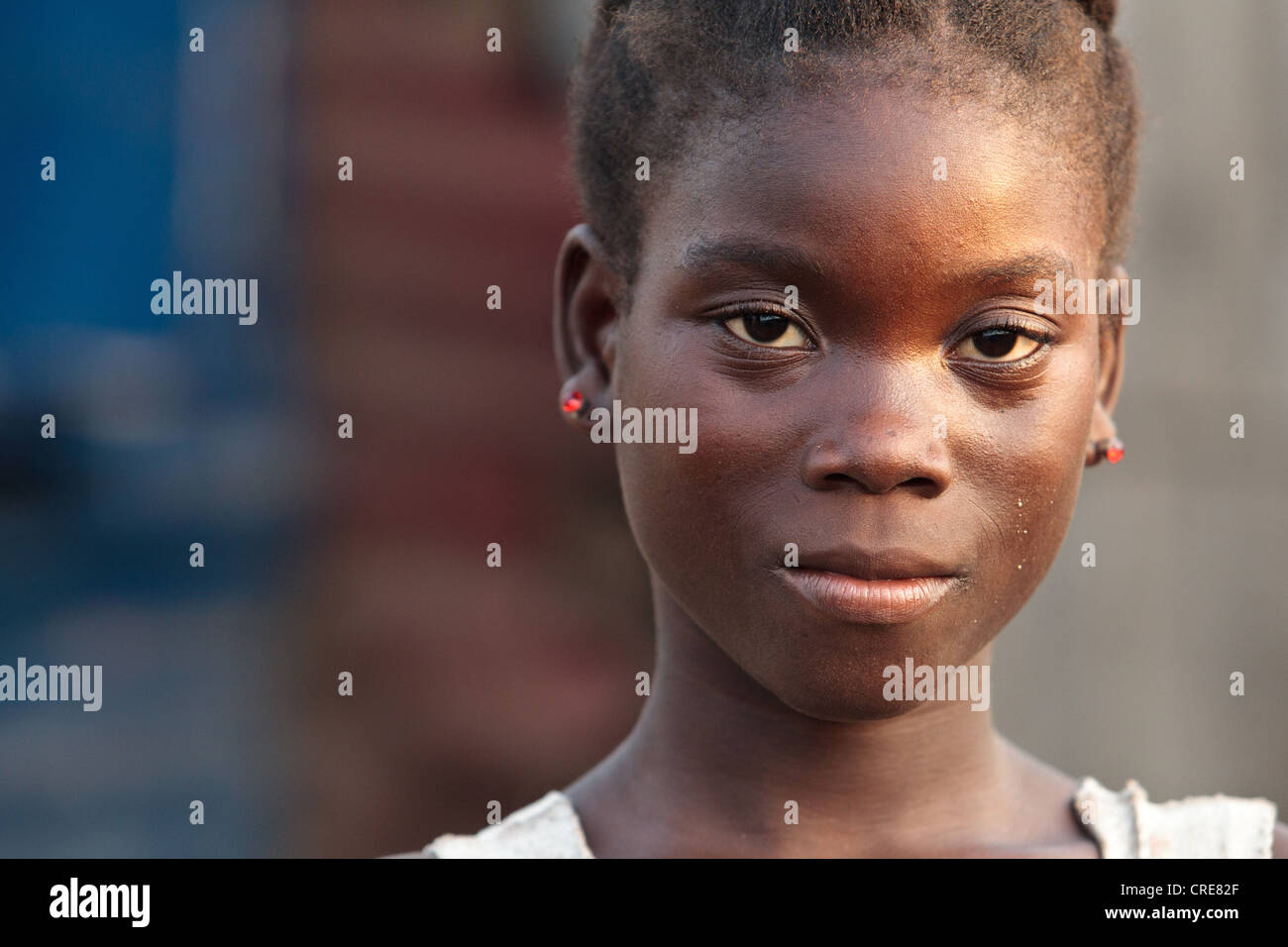 Portrait of a teenage girl in the Clara Town slum of Monrovia, Montserrado county, Liberia on Thursday April 5, 2012. Stock Photo
