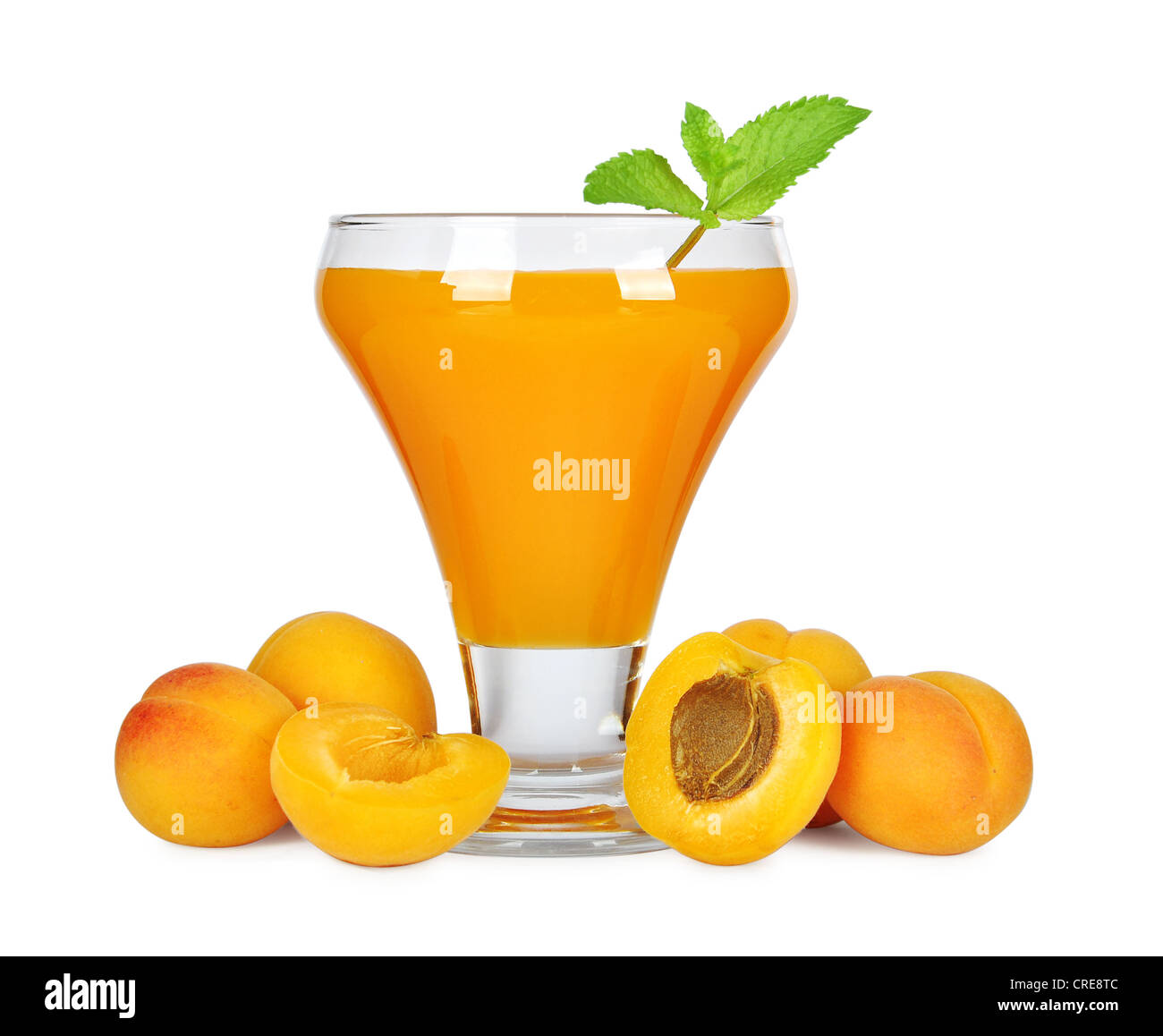 Apricot juice in glass isolated on white background Stock Photo Alamy