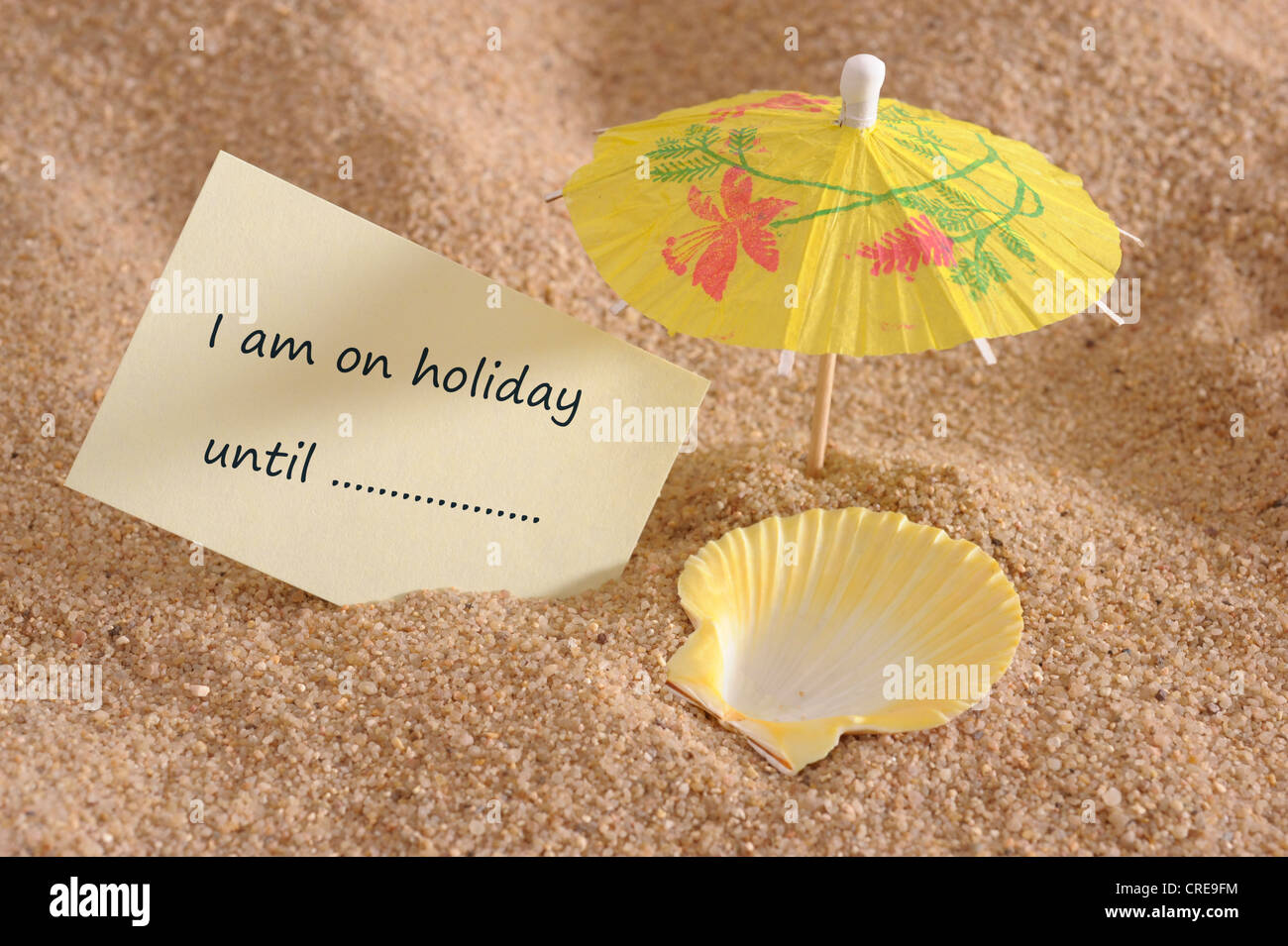 memo at beach marked with note for holiday Stock Photo