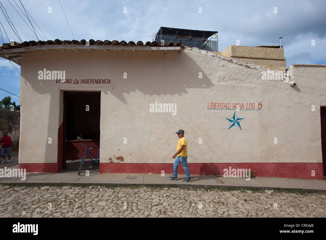 A bar in Trinidad, Cuba with Libertad Para Los 5 painted on the side. Stock Photo