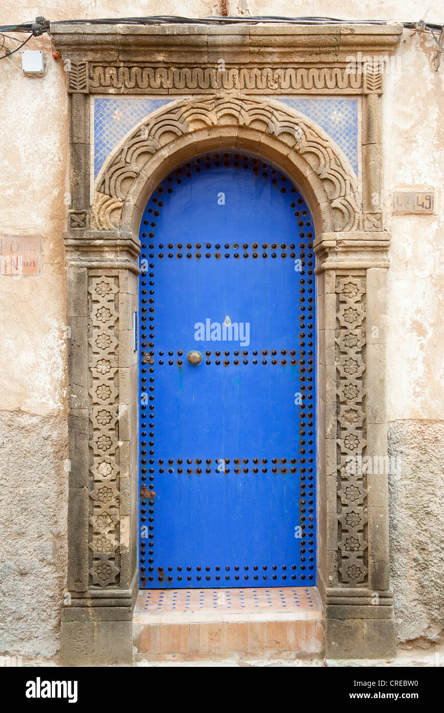 Typical old wooden door to a residential building in the historic town or medina, UNESCO World Heritage Site, , Morocco, Africa Stock Photo