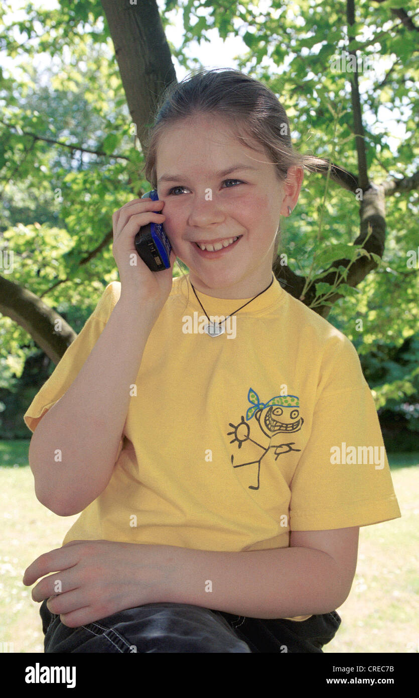 Child with mobile phone, Essen, Germany Stock Photo