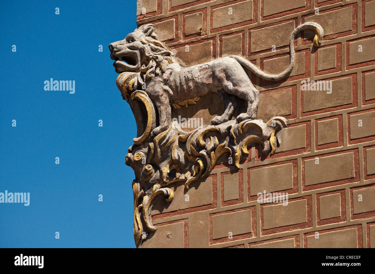 Low relief sculpture of lion at house corner at Old Town Market Square in Warsaw, Poland Stock Photo