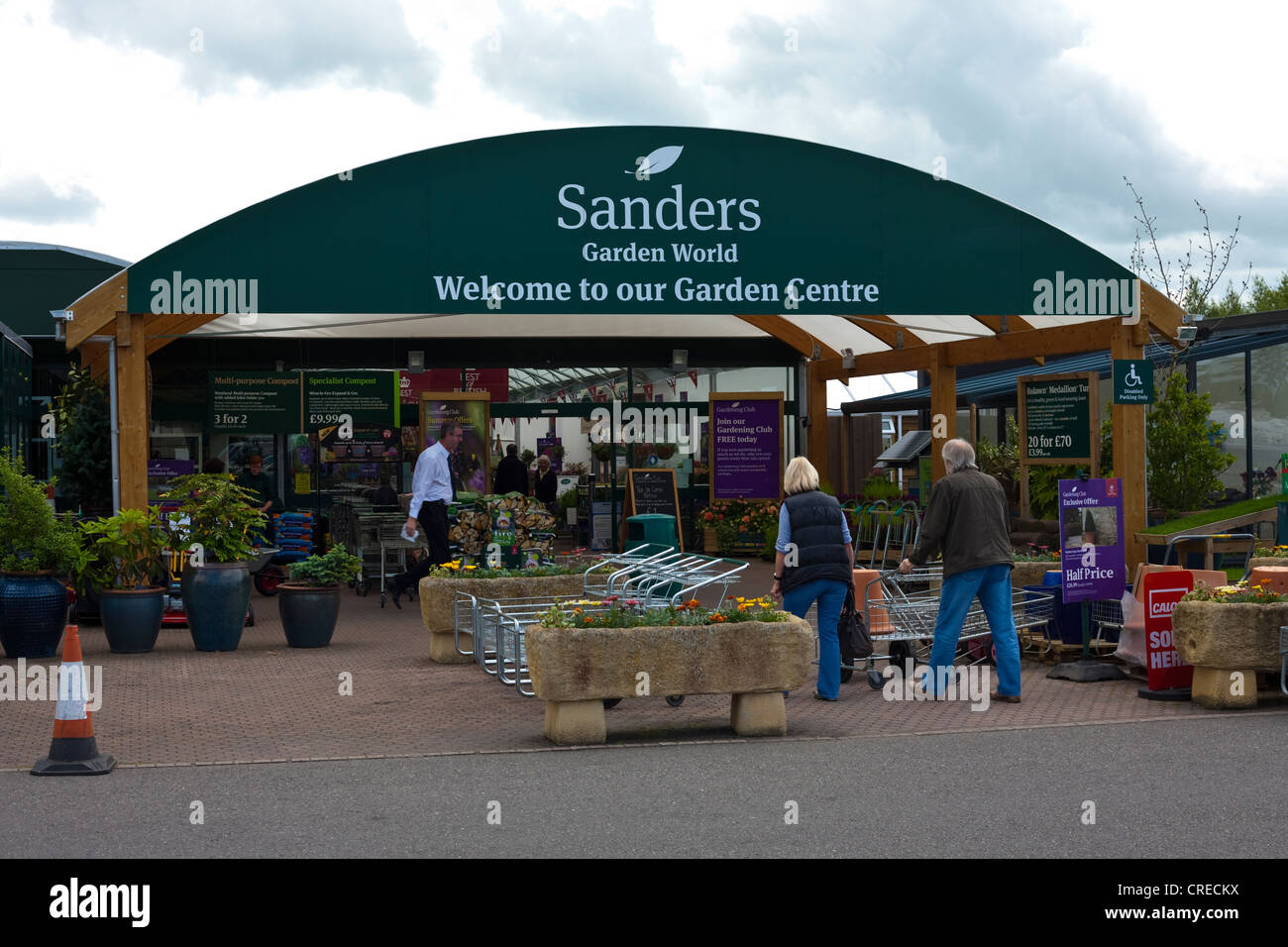 saunders garden centre entrance in brent knoll somerset with people shopping Stock Photo