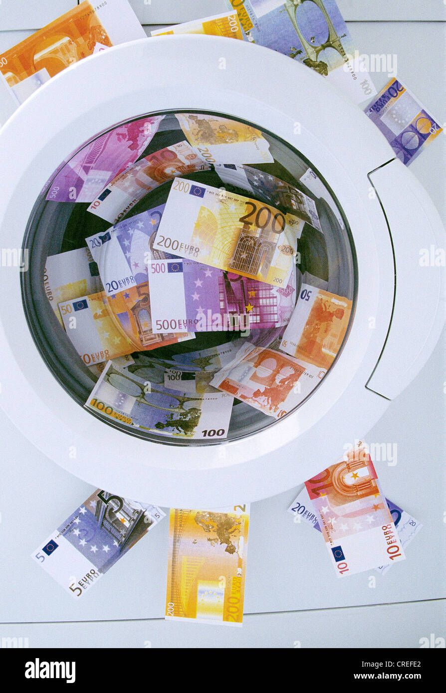 Euro banknotes in a washing machine Stock Photo Alamy