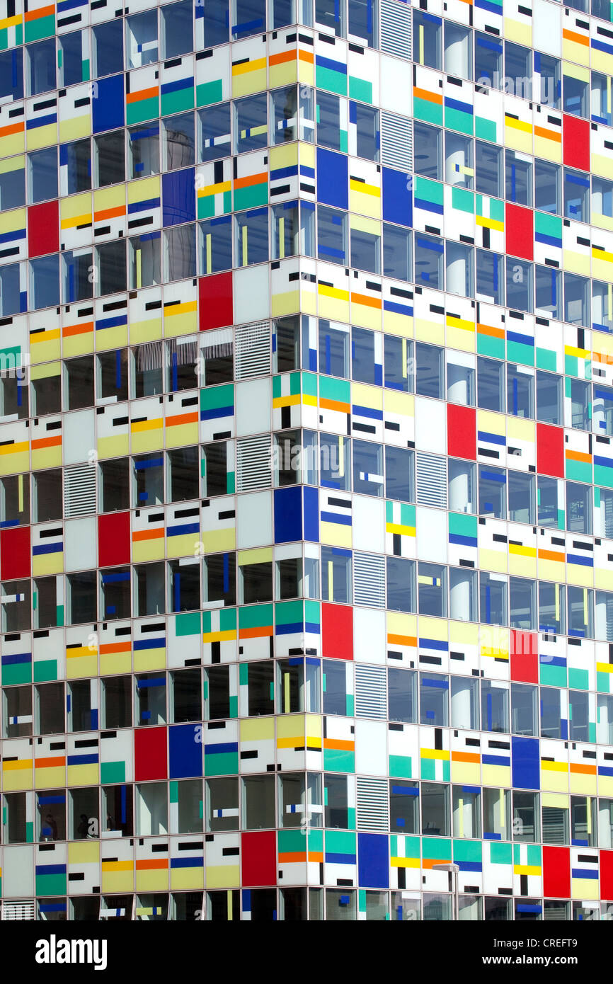 Colorful glass facade of the modern Colorium tower, Medienhafen port in