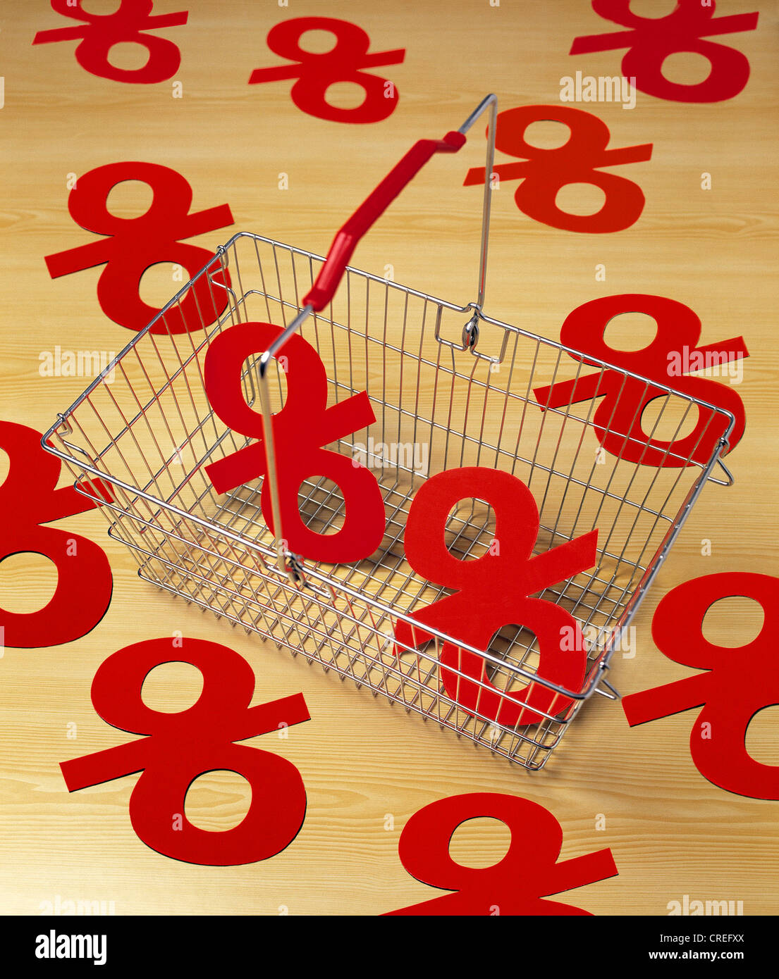 Basket with percent symbols Stock Photo