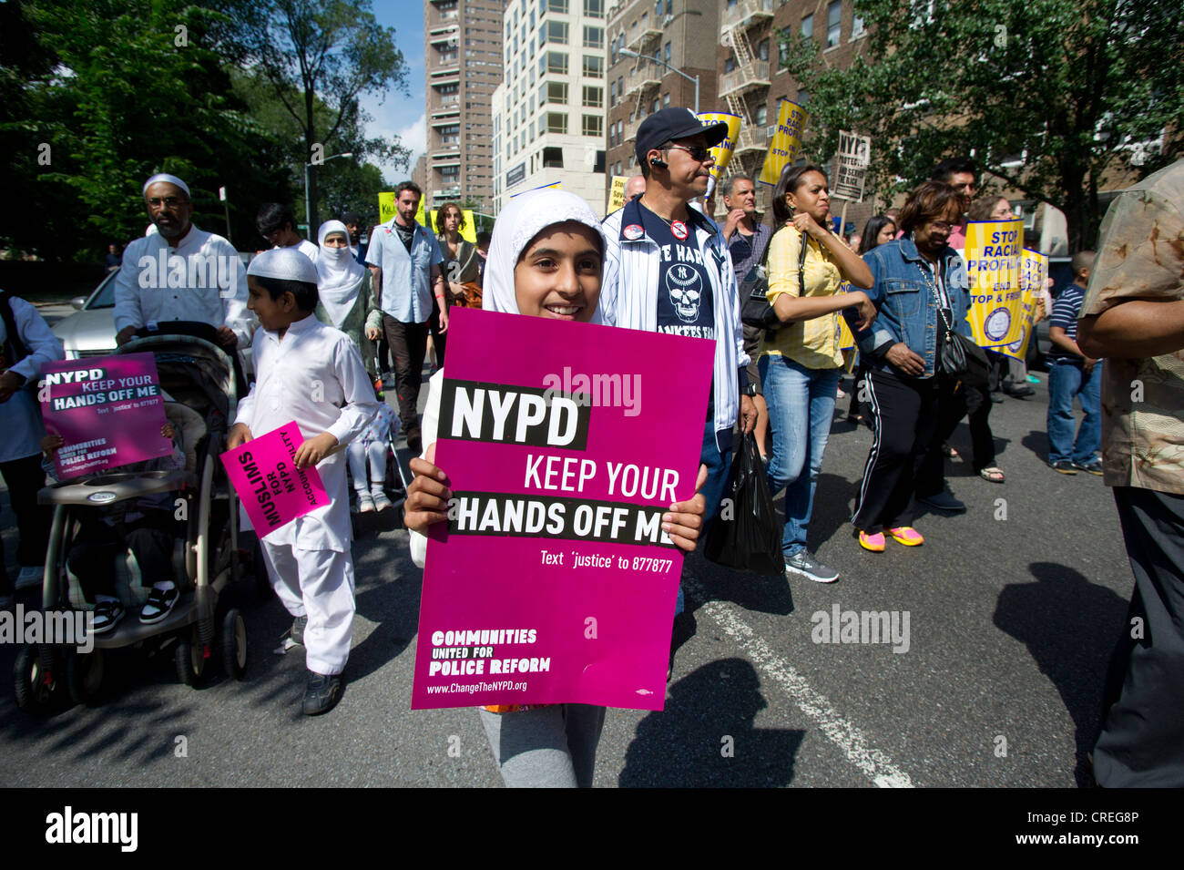 Thousands of demonstrators march down Fifth Avenue in New York for a silent march protesting the NYPD policy of stop and frisk Stock Photo