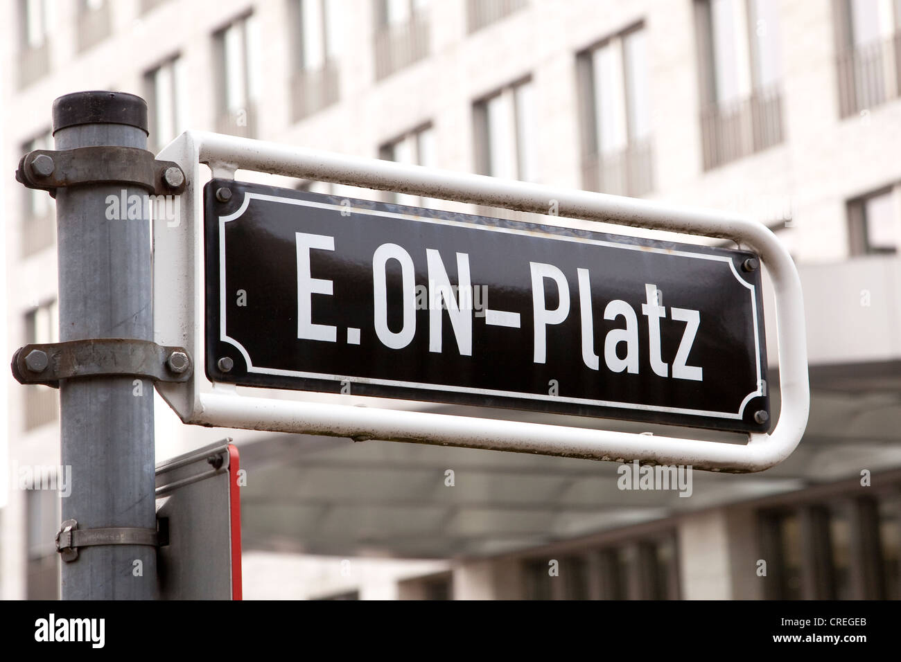 Street sign, E.ON-Platz, in front of the headquarters of the energy group EON AG in Duesseldorf, North Rhine-Westphalia Stock Photo