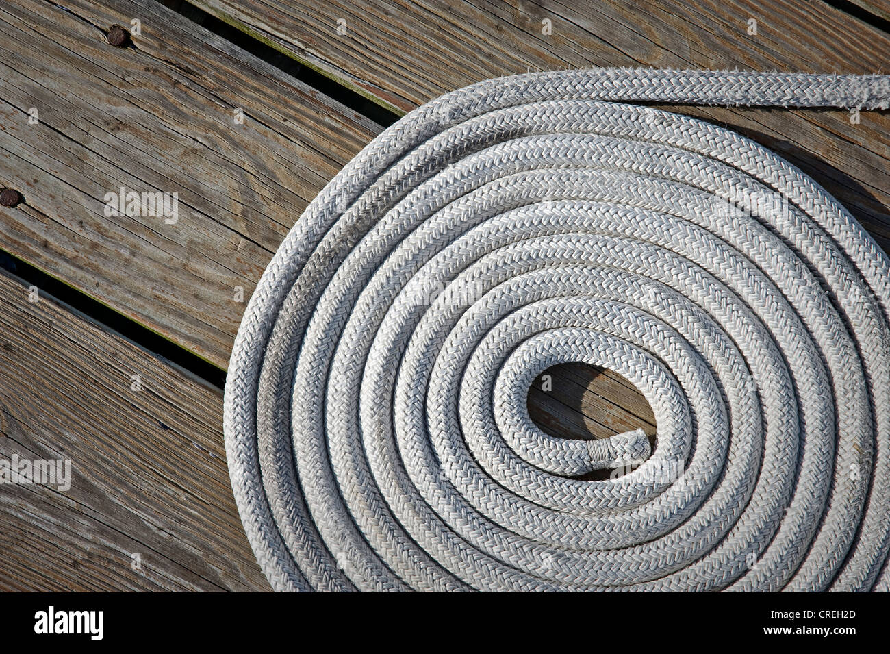 Rope Coil On Boat Dock Detail Stock Photo