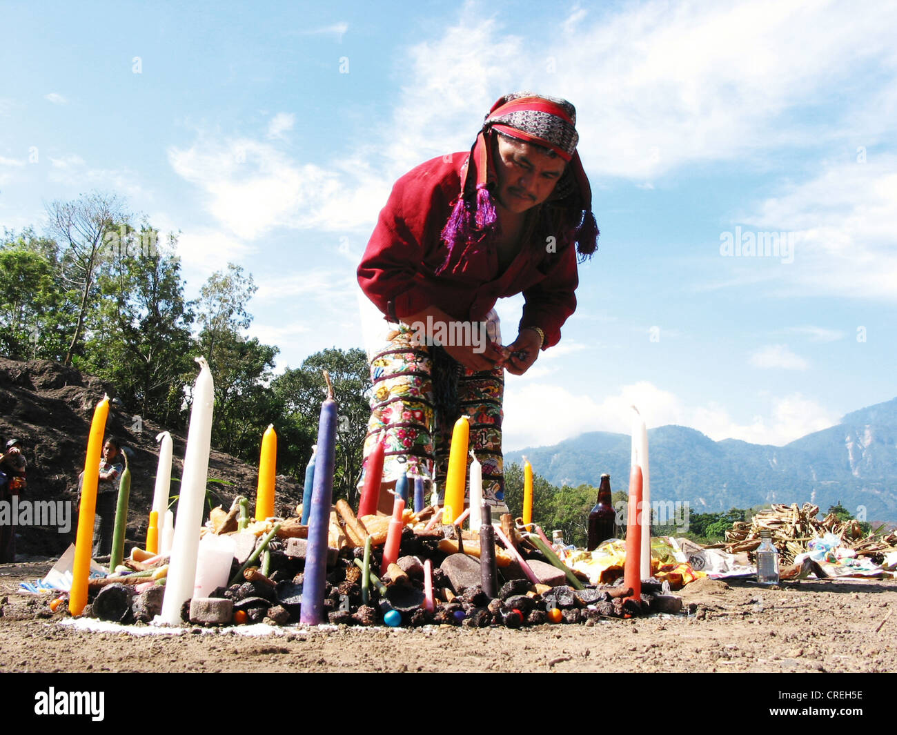 Mayan priests in ritual with Maya altar, burning candles and offeringsin Panabaj, Lake Atitlan, Guatemala, Atitlansee, Panabaj Stock Photo