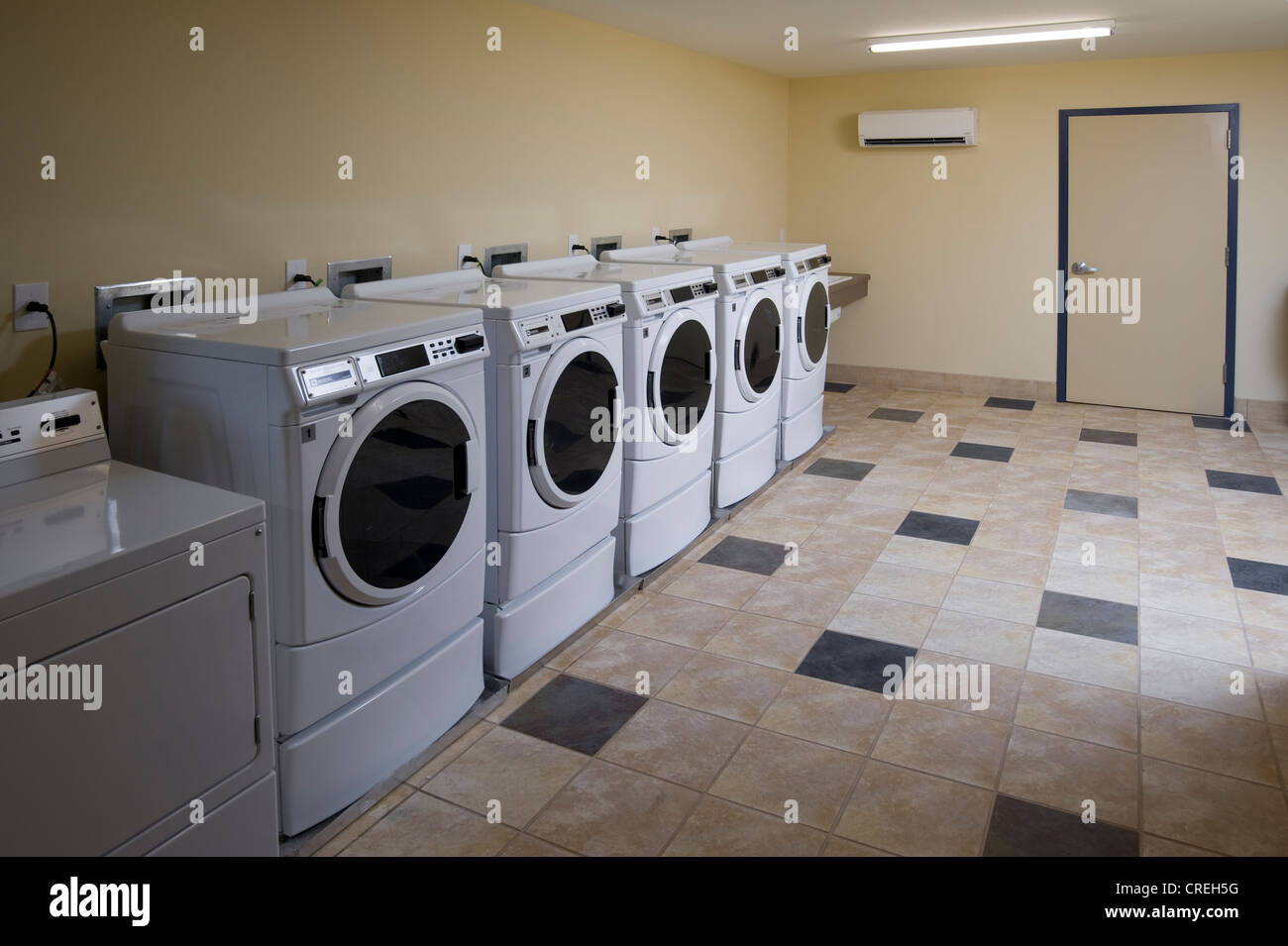 Washing Machines In Laundromat Laundrette, Philadelphia, USA Stock Photo