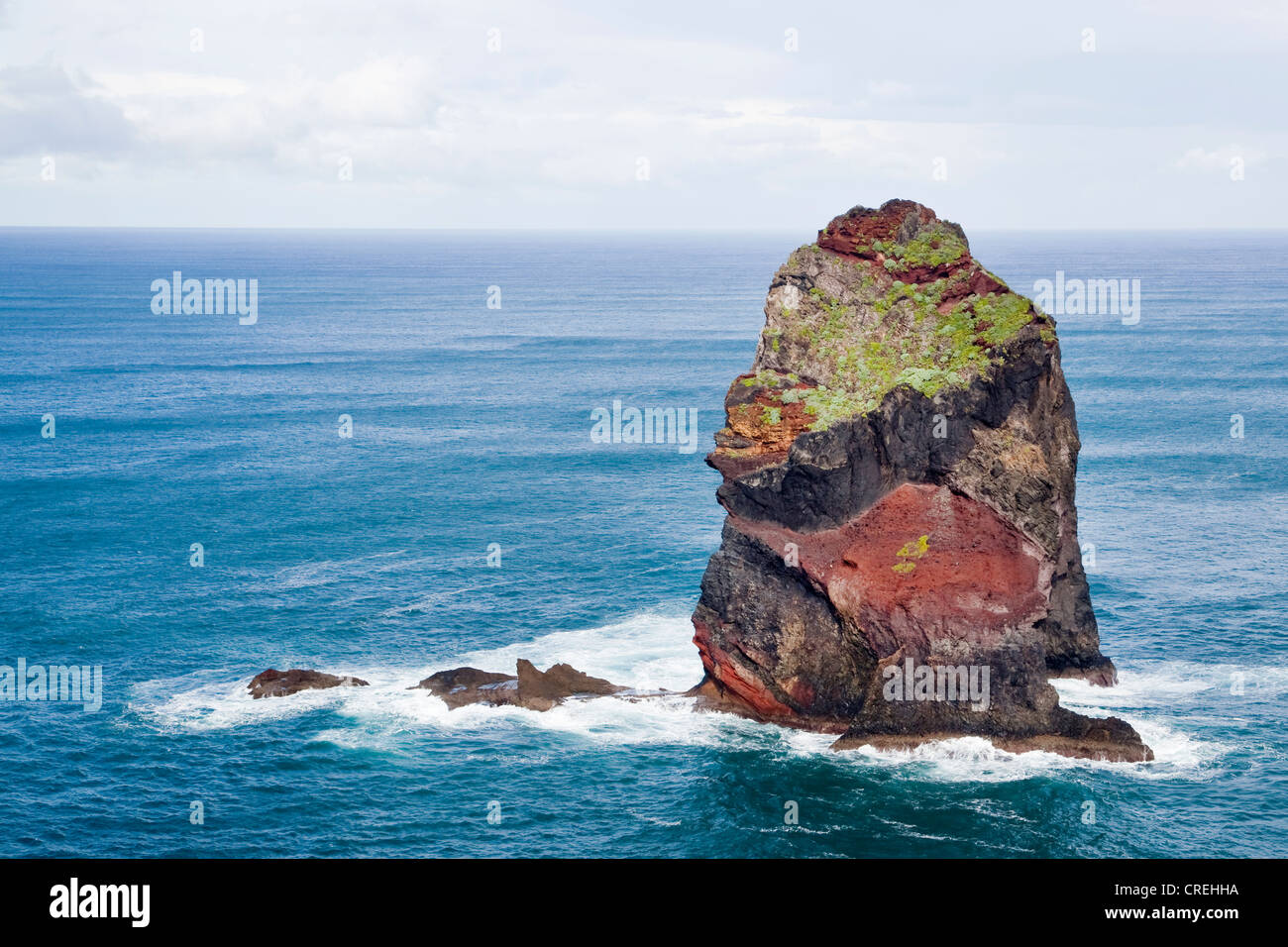 Lava rock cliffs on the Atlantic coast, peninsular and nature reserve Ponta de São Lourenço, in , Portugal, Europe Stock Photo