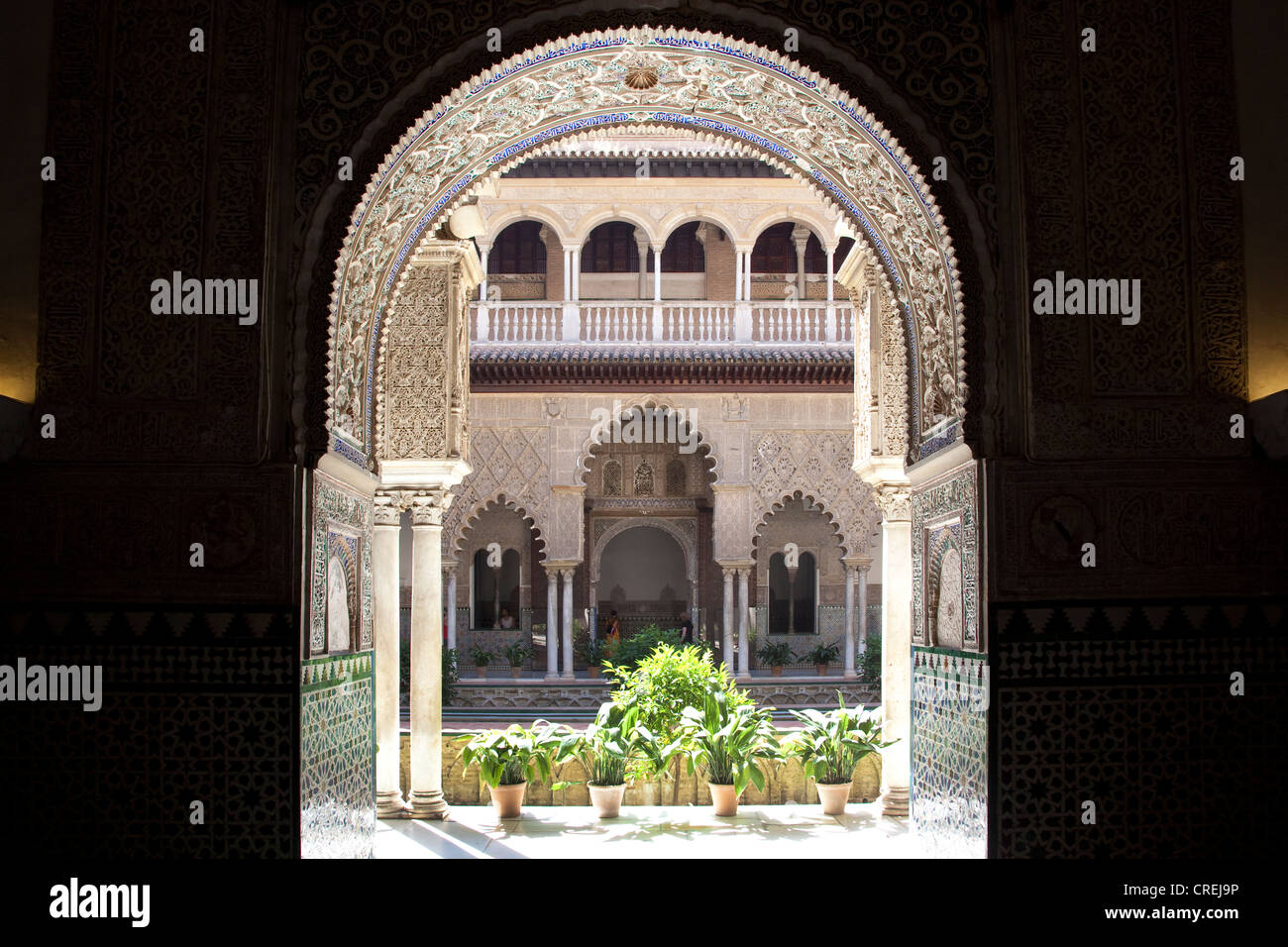 Moorish ornamentation on the Patio de las Doncellas in the Moorish King's Palace of Real Alcazar, UNESCO World Heritage Site Stock Photo