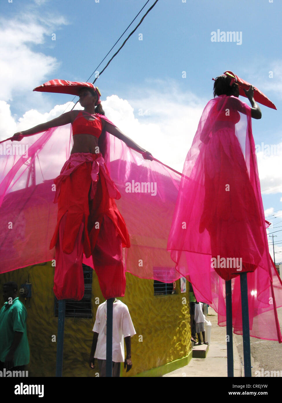 Trinidad and tobago carnival stilts hires stock photography and images