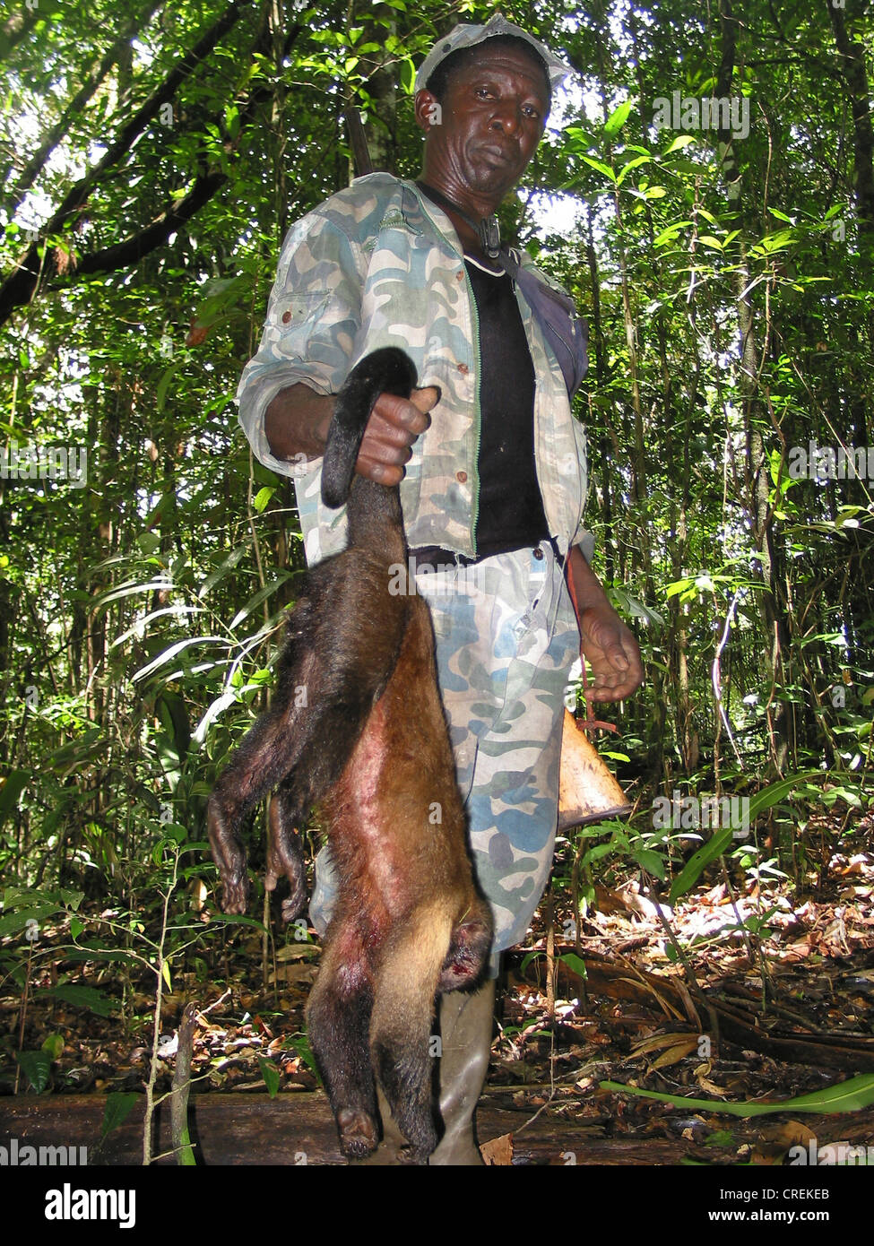 Maroon hunt monkeys in the jungle on the Marowijne River, Suriname, Marowijne, Loka Loka Stock Photo