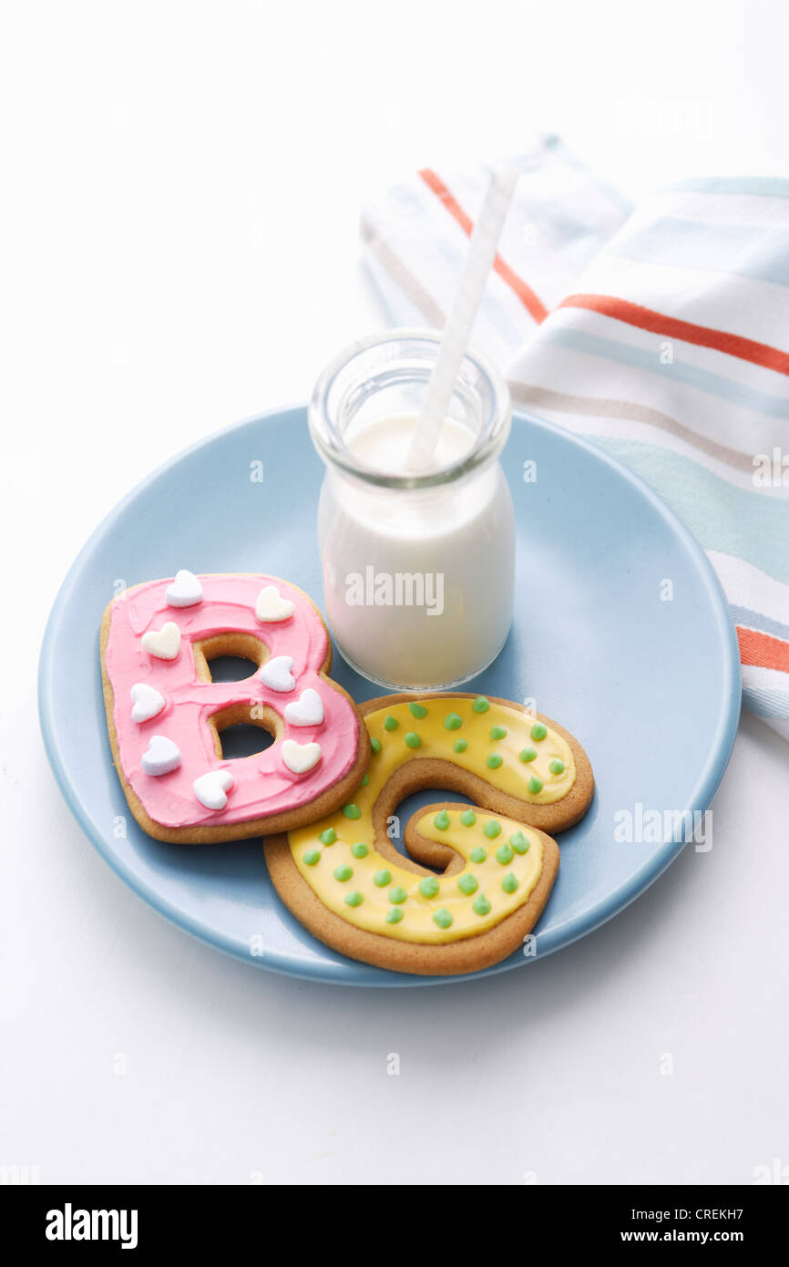Decorated cookies in letter shapes Stock Photo