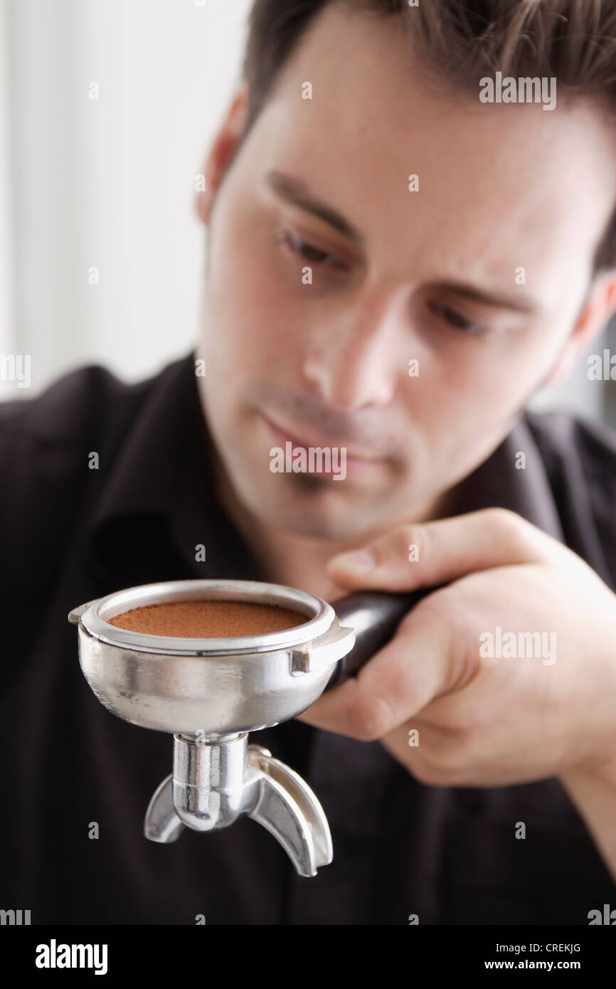 Barista using espresso machine Stock Photo Alamy