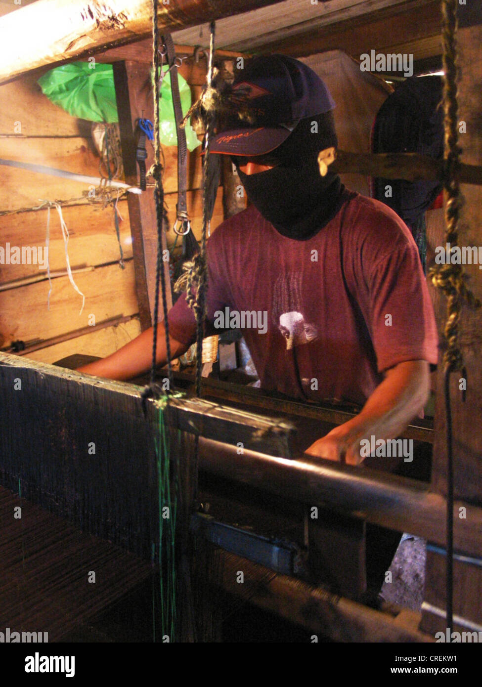 Zapatista with loom in his hut, Mexico, Chiapas, Polh� Stock Photo
