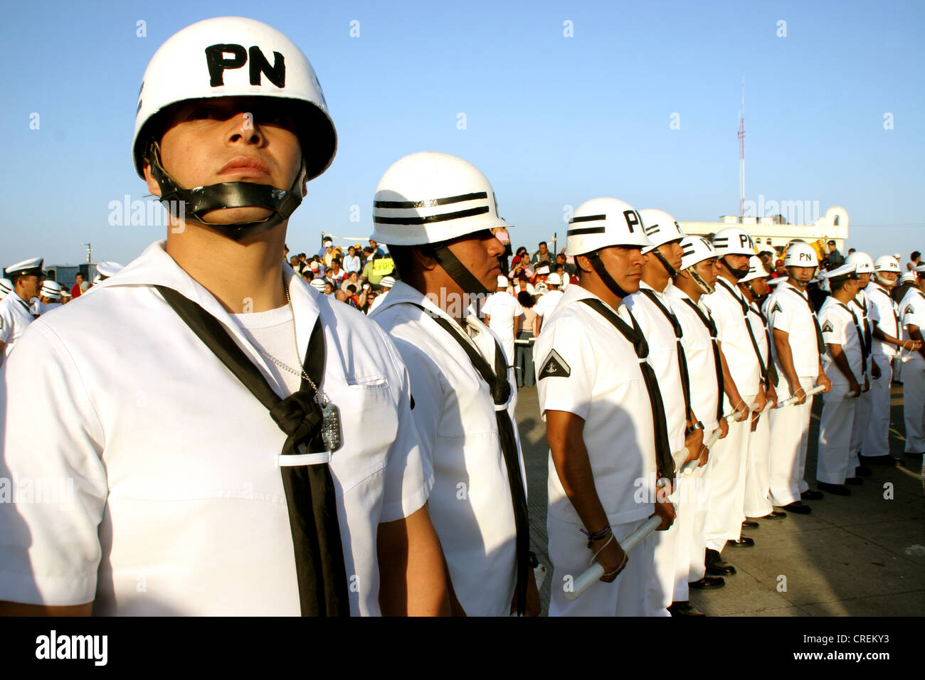 Mexican police in file and with white uniforms, Mexico, Veracruz, Veracruz Stock Photo