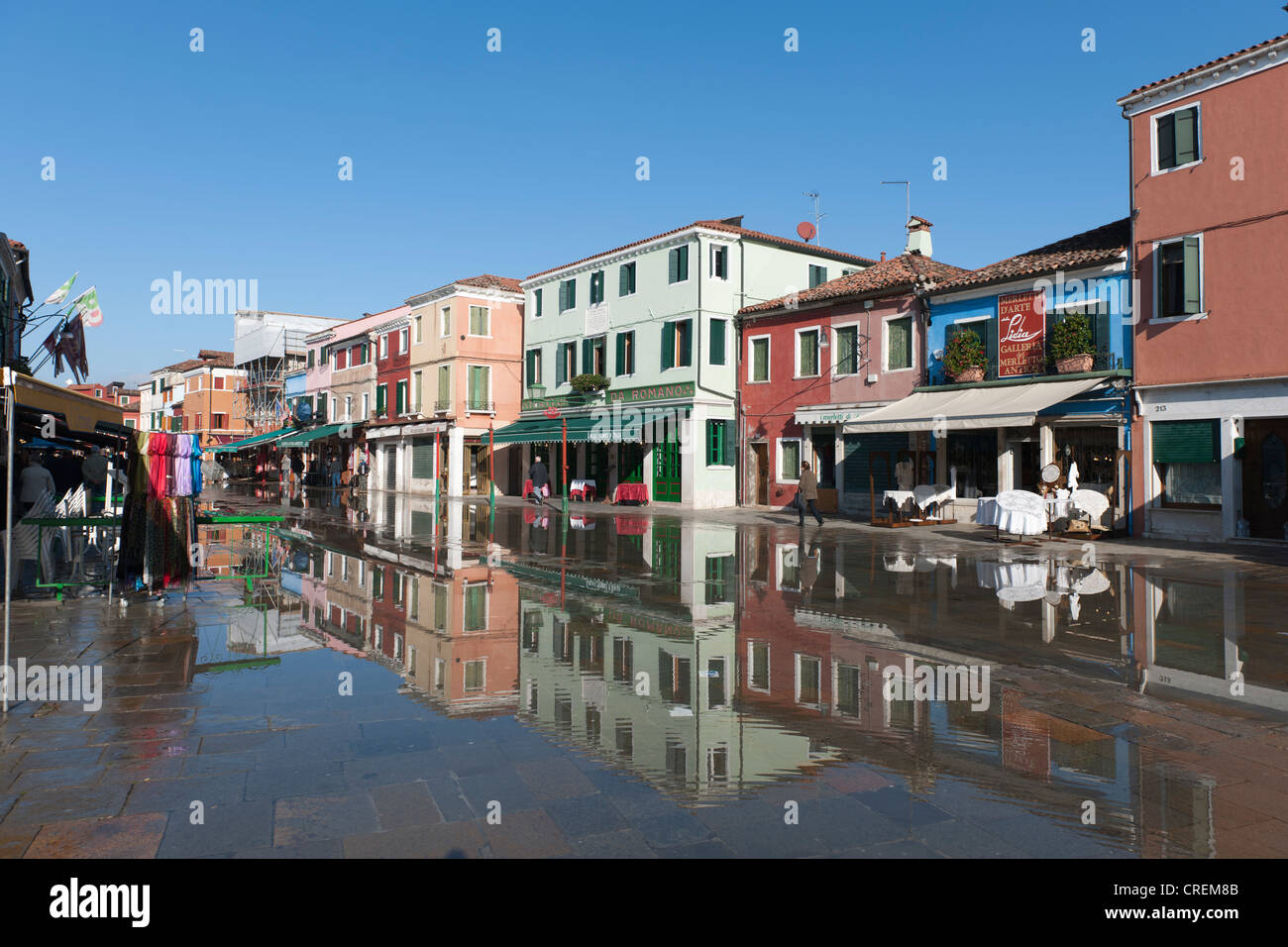 Winter floods, aqua alta, flooding the main shopping street, houses are