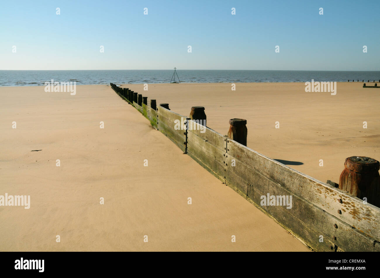 Groynes and sandy beach, Frinton Essex Stock Photo
