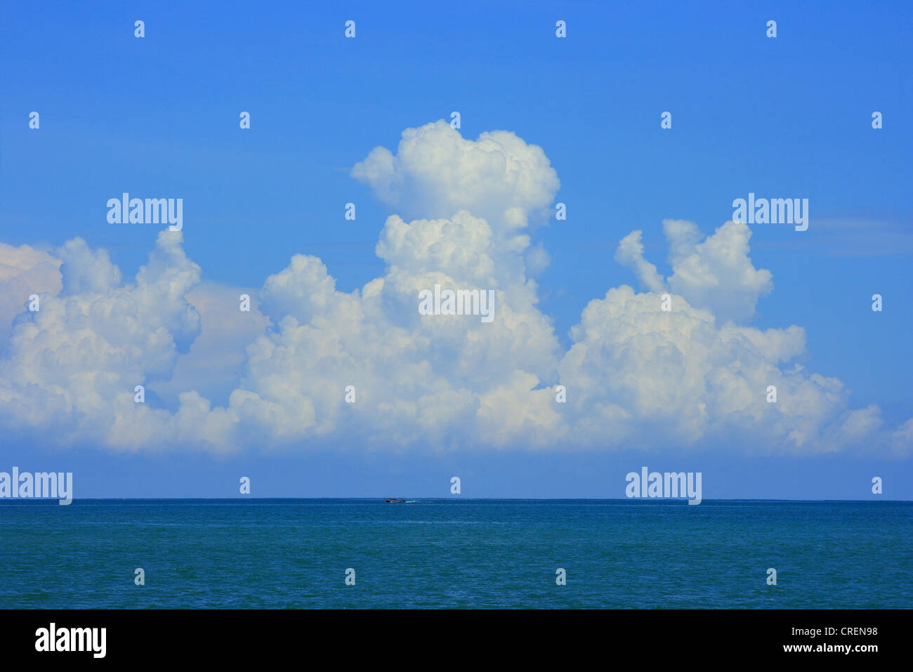 cumulus clouds over the Andaman Sea, cumulus congestus, Thailand, Phuket, Nai Yang Beach Stock Photo