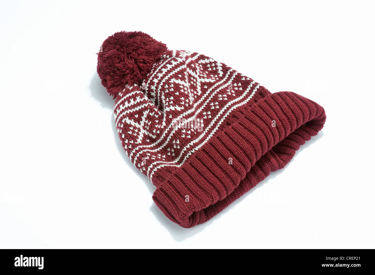 white woollen bobble hat Stock Photo 
