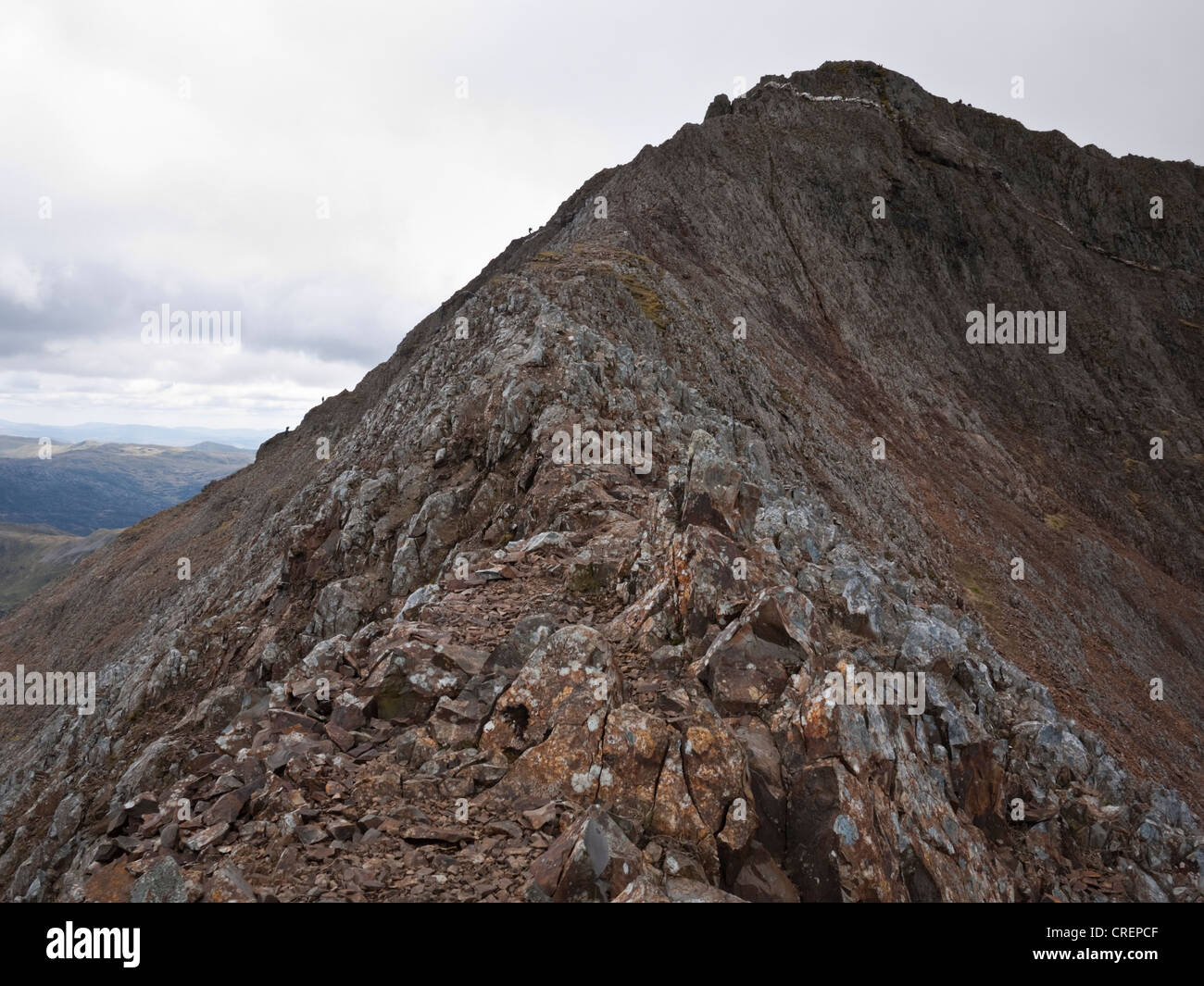 A view along the north ridge of Crib Goch, Snowdonia, showing the east ridge coming in from the left and the main arete Stock Photo