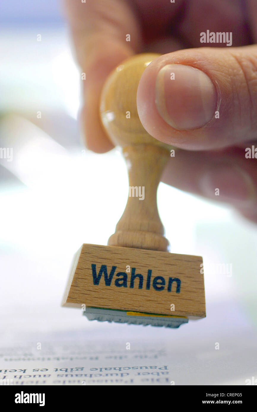 hand with a stamp Wahlen, elections Stock Photo
