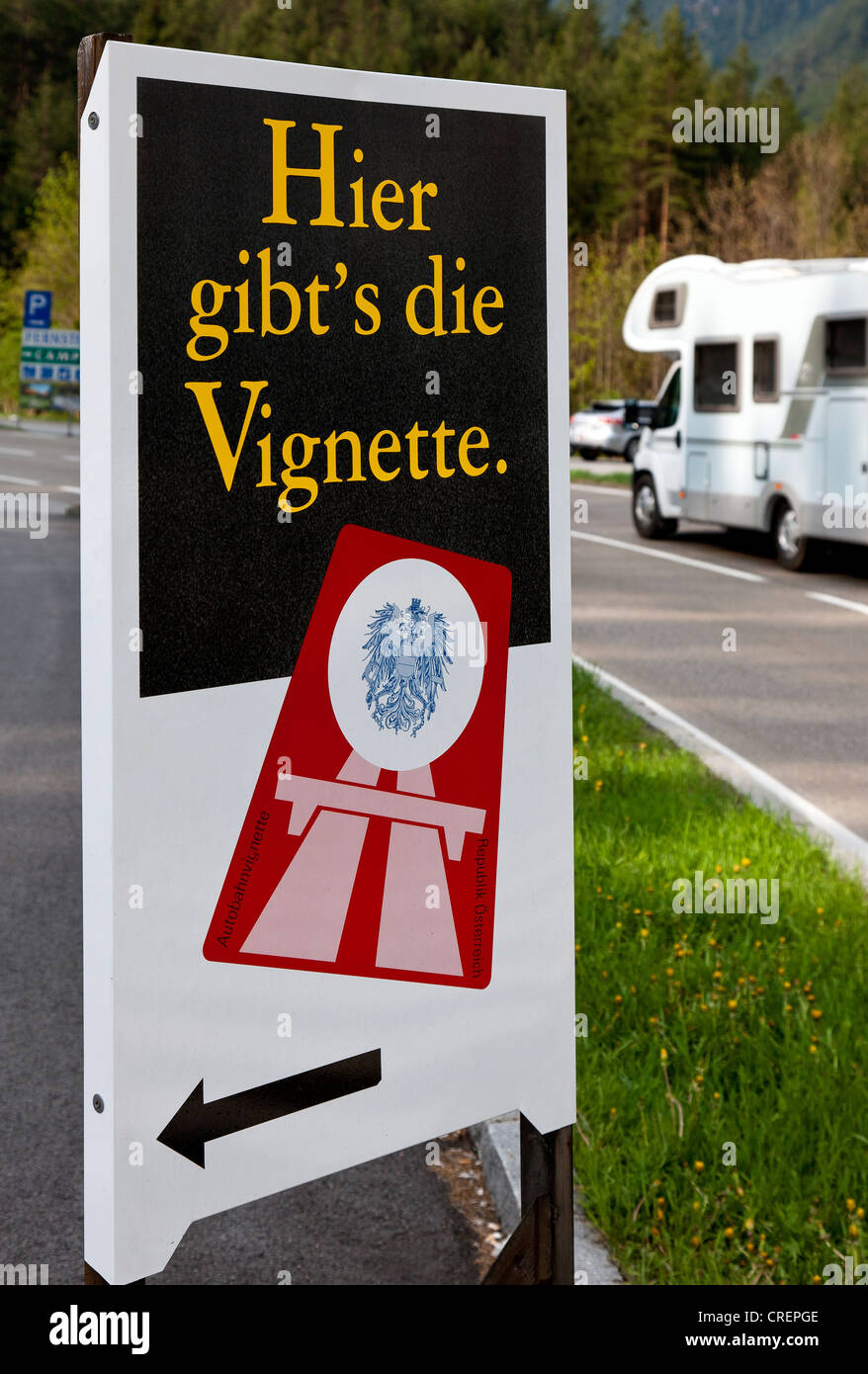 Sign, 'Hier gibt's die Vignette' or 'Get your road tax disc here', Fernpass, Austria, Europe Stock Photo