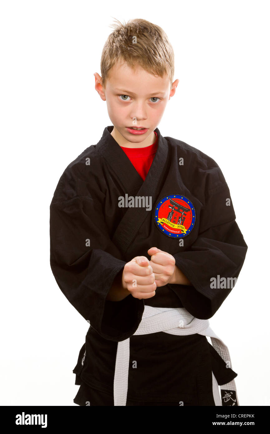 A boy, 9 years, wearing martial arts suit Stock Photo Alamy