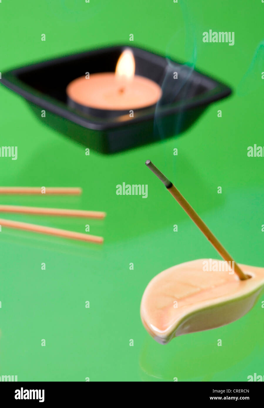 joss sticks and tealight Stock Photo Alamy