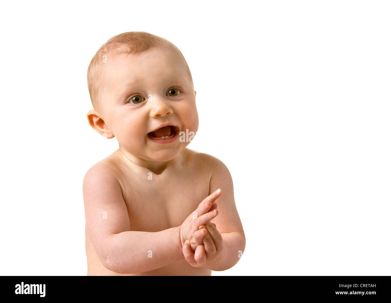 Bright happy 7 month old baby laughing and clapping Stock Photo Alamy