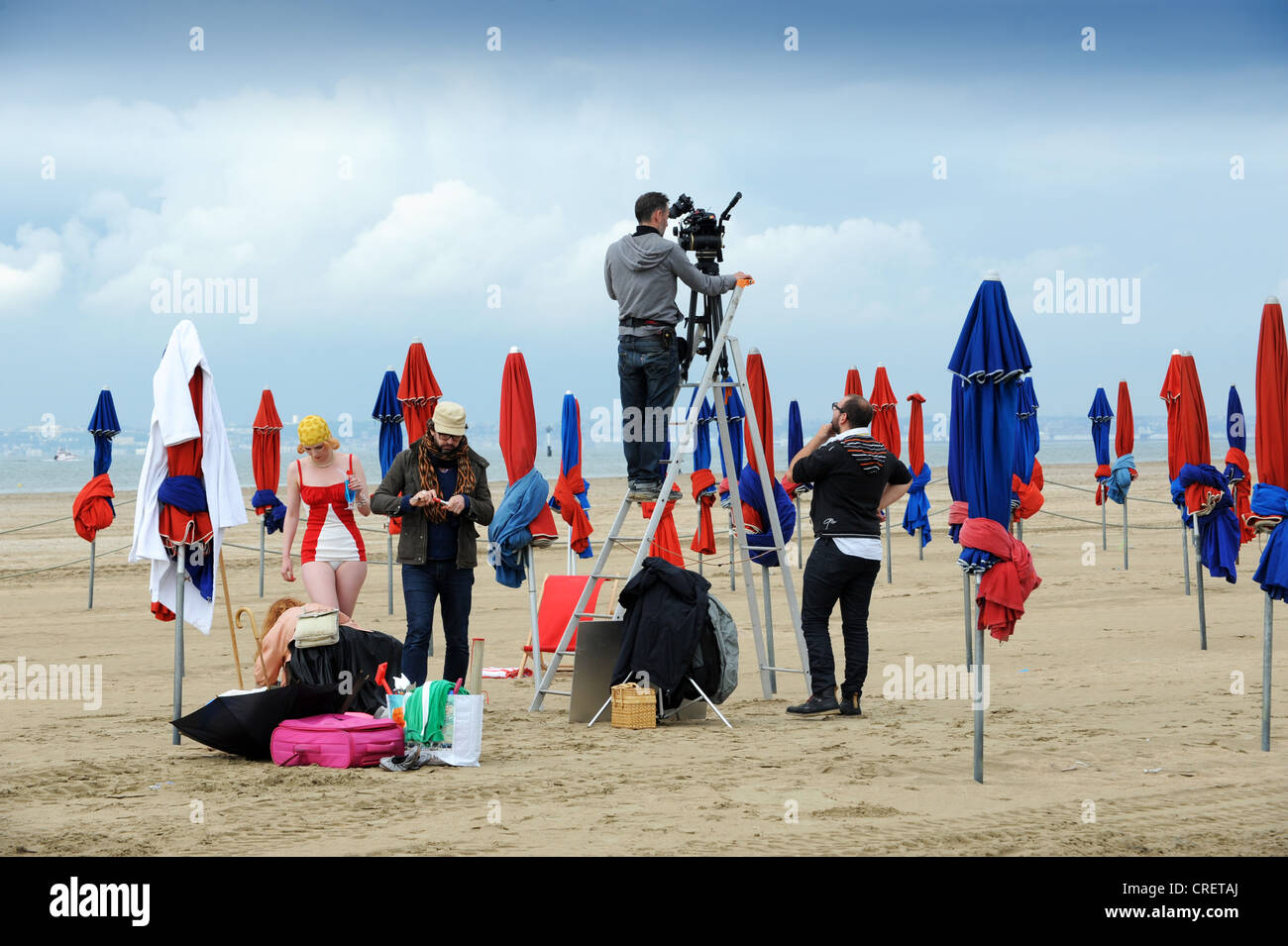 Film crew on beach at Deauville Normandy France they were filming for the new Sebastien Chabal clothes 'Ruckfield' Stock Photo
