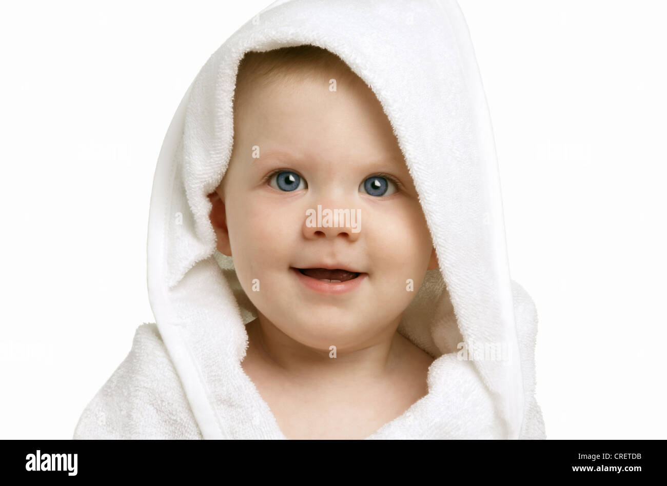 Happy one year old baby in a hooded towel bath wrap Stock Photo - Alamy