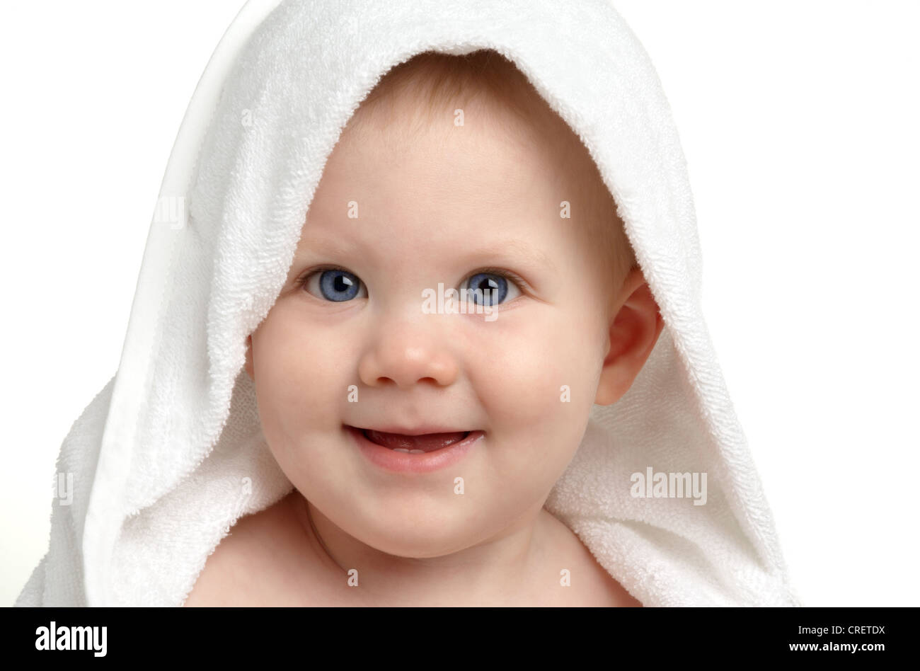 One year old baby in a hooded towel bath wrap Stock Photo Alamy
