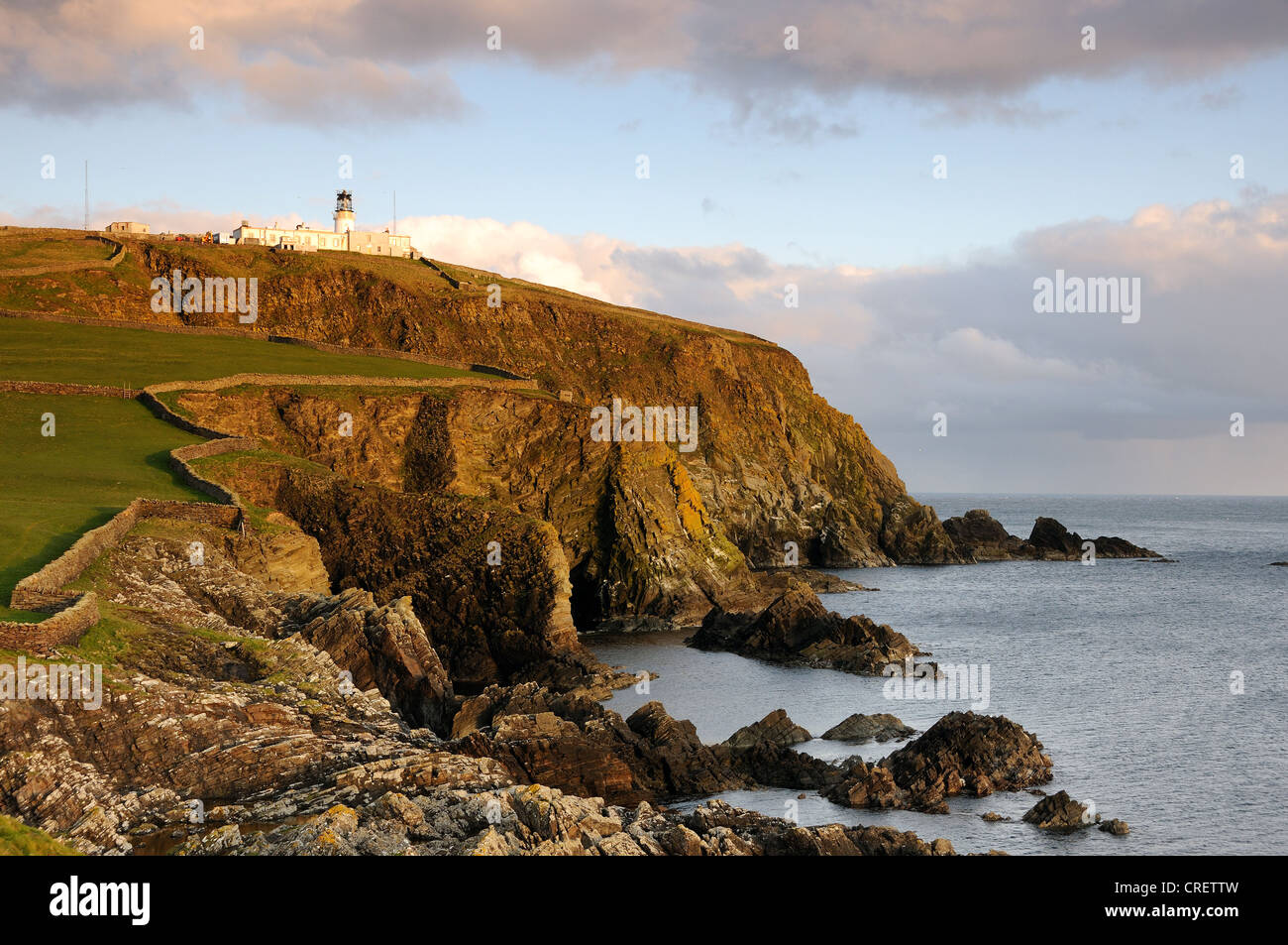Sumburgh Head Lighthouse at sunset, Shetland Stock Photo