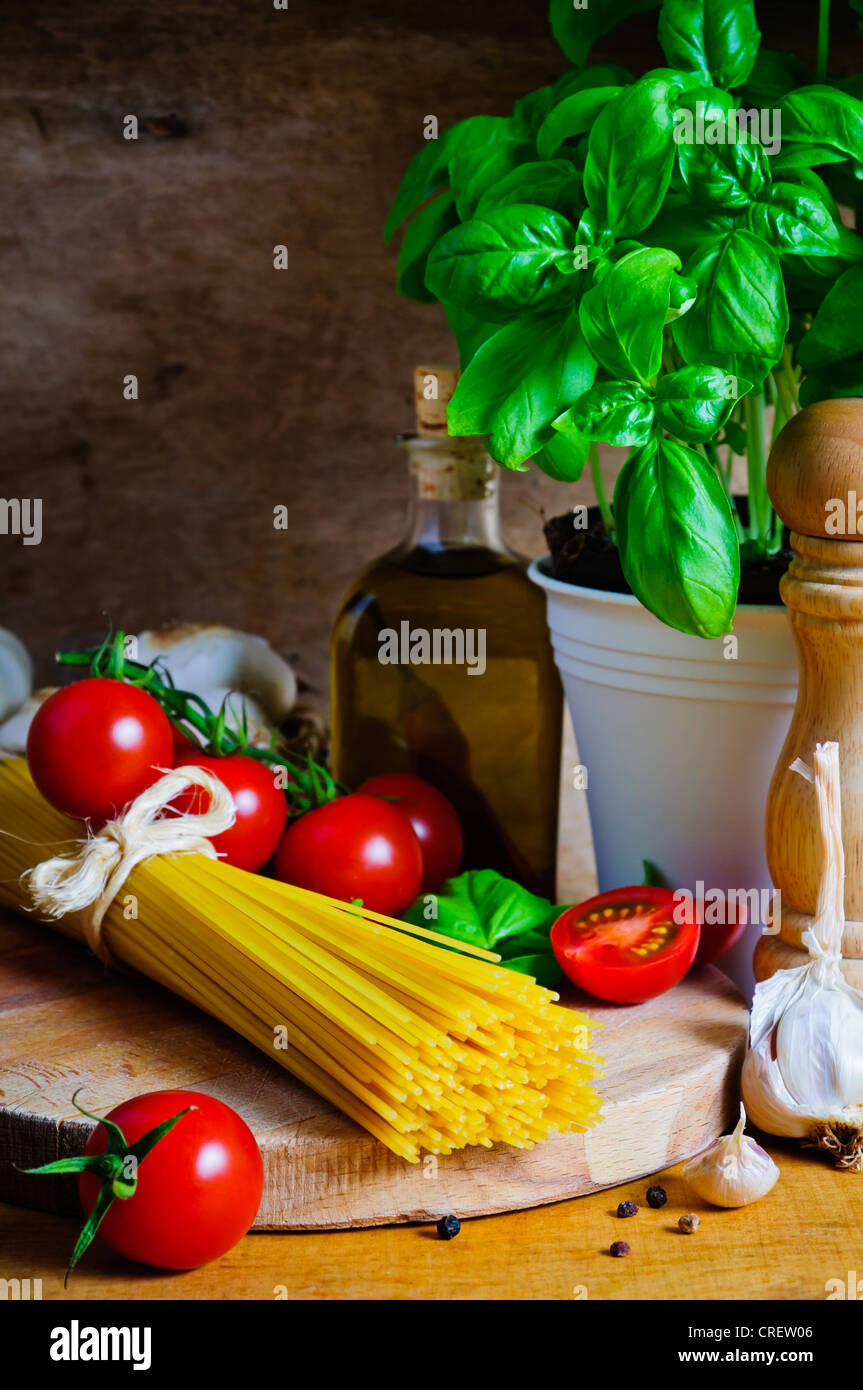 Still life with italian cooking ingredients for spaghetti Stock Photo