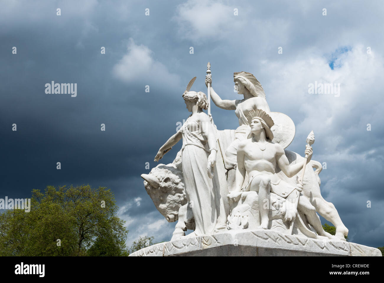 America group of sculptures against a stormy sky at Albert Memorial, London, England. Stock Photo